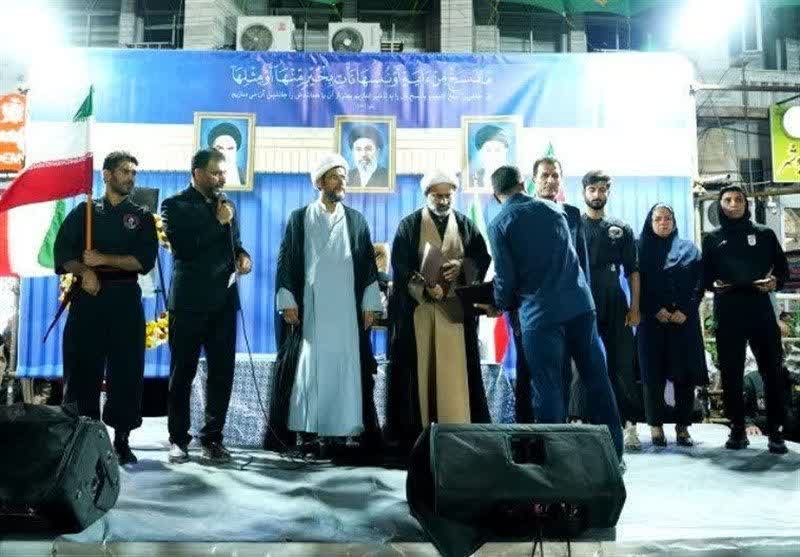تجلیل از بانوی ملی‌پوش و خانواده‌های شهدای جنگ رمضان در بوشهر